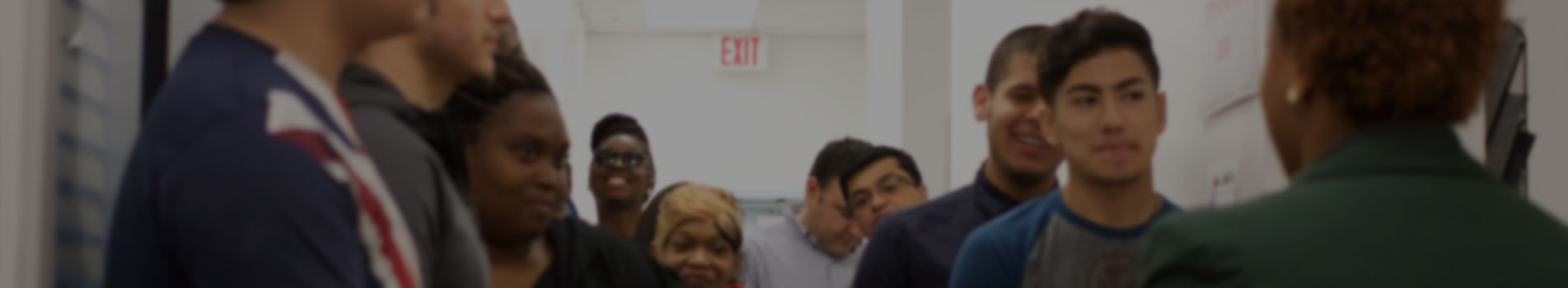 Students smiling in the hallway