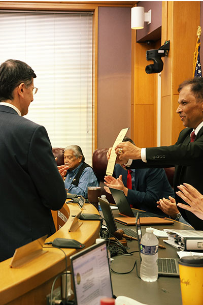 Taban receiving the award